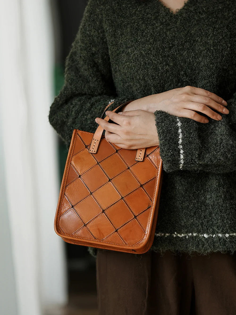 Handcrafted brown cowhide leather shoulder bag with stitched diamond pattern