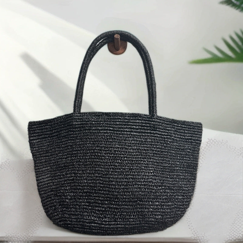 Handwoven raffia beach tote in natural colour – large woven straw bag for resort and vacation