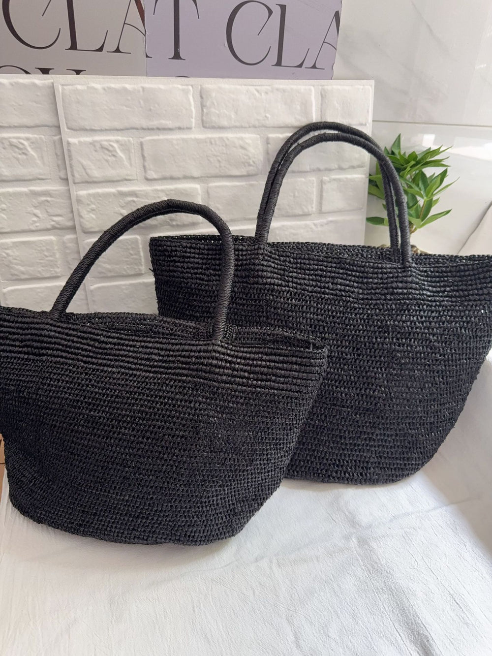 Handwoven raffia tote bag in khaki – large natural straw beach bag for summer and resort