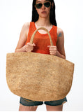 Large handwoven raffia tote bag in natural colour – spacious women's beach and resort bag