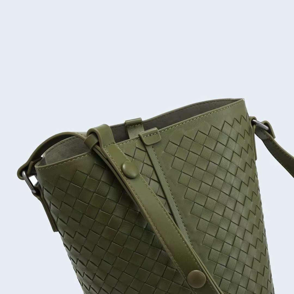 Olive green woven lambskin leather bucket bag with shoulder strap and snap closure