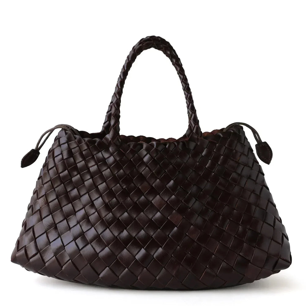 Dark brown woven leather hobo trapezoidal shoulder bag with braided handle on white background