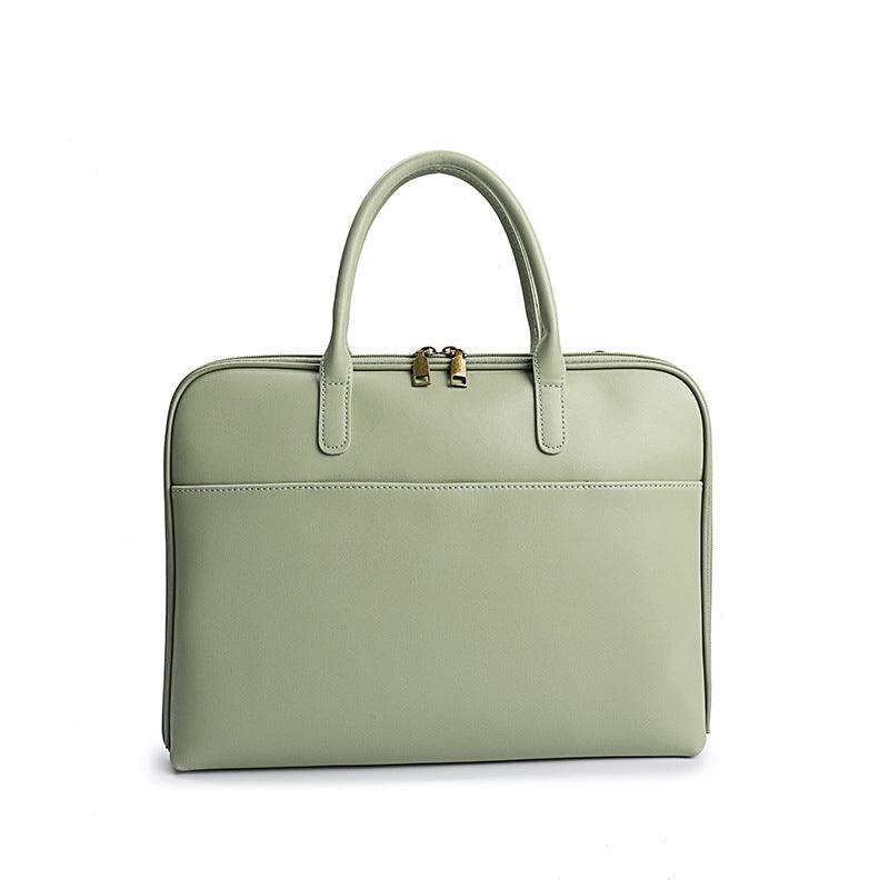 Pastel green leather laptop bag for women with dual handles and front pocket, office style