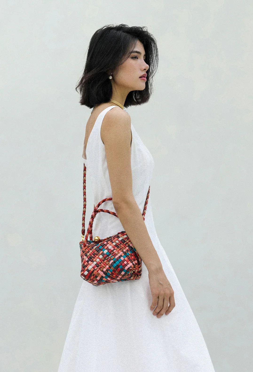 Luxury Handwoven Lambskin Leather Shoulder Bucket Bag with Sculptural Gold Sphere Closure and Double Handle Design – Spacious & Versatile Carryall