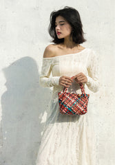 Luxury Handwoven Lambskin Leather Shoulder Bucket Bag with Sculptural Gold Sphere Closure and Double Handle Design – Spacious & Versatile Carryall