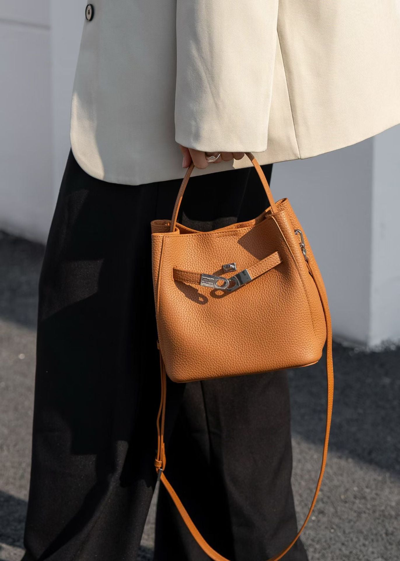 Luxury Pebbled Cowhide Leather Bucket Bag, Designer Crossbody with Twist Lock