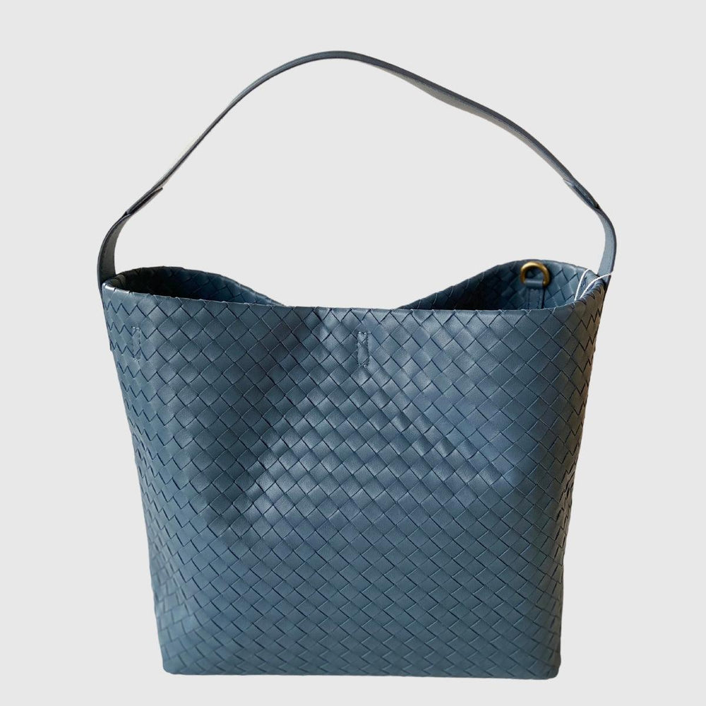 Medium blue woven lambskin leather tote bag with wide handle, elegant and minimalist design