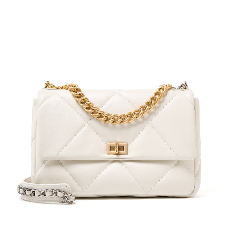 White quilted genuine leather shoulder bag with gold chain strap and turn-lock closure
