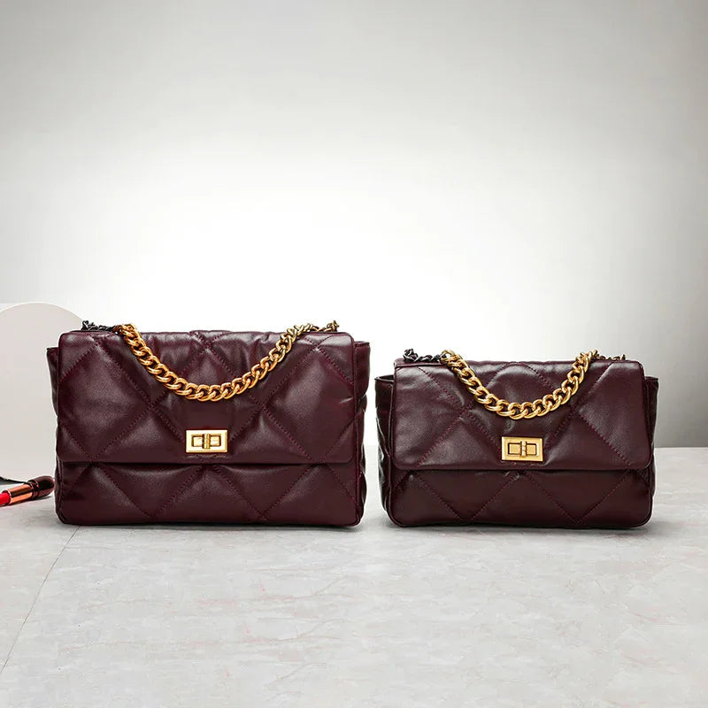 Quilted burgundy leather flap shoulder bags with gold chain straps and diamond stitching