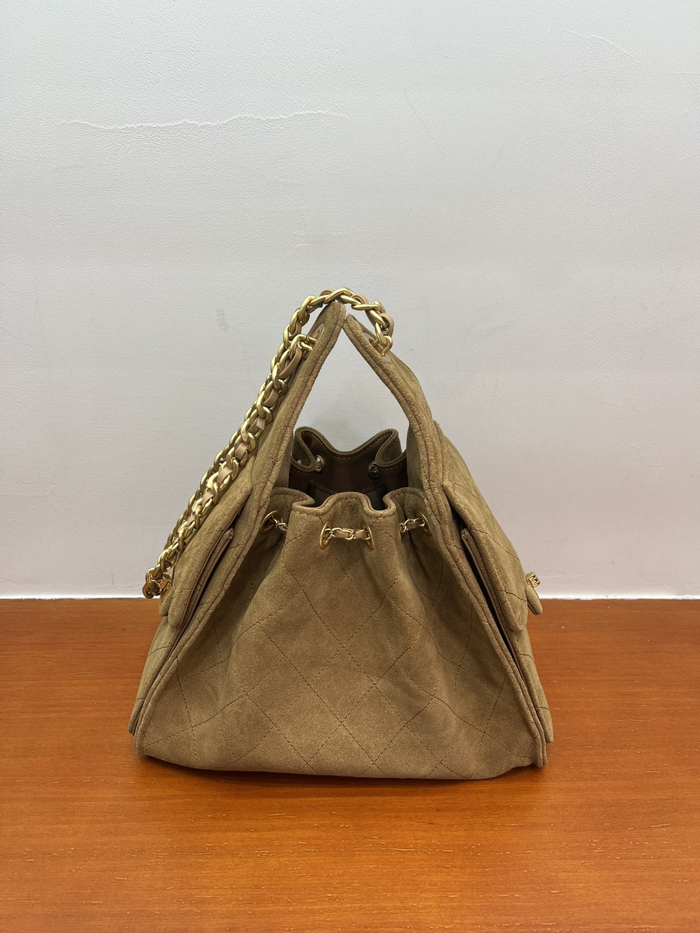 Quilted Suede Lambskin Drawstring Bucket Bag – Gold Chain Shoulder Bag | Diamond Quilt with Side Flap Pockets & Turn-Lock Clasp