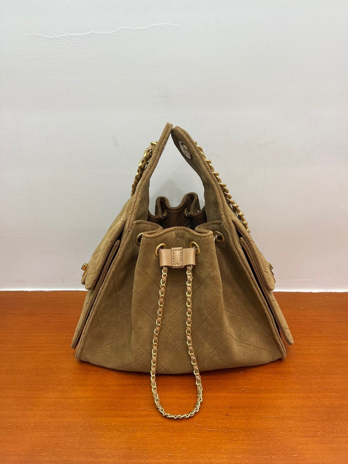 Quilted Suede Lambskin Drawstring Bucket Bag – Gold Chain Shoulder Bag | Diamond Quilt with Side Flap Pockets & Turn-Lock Clasp