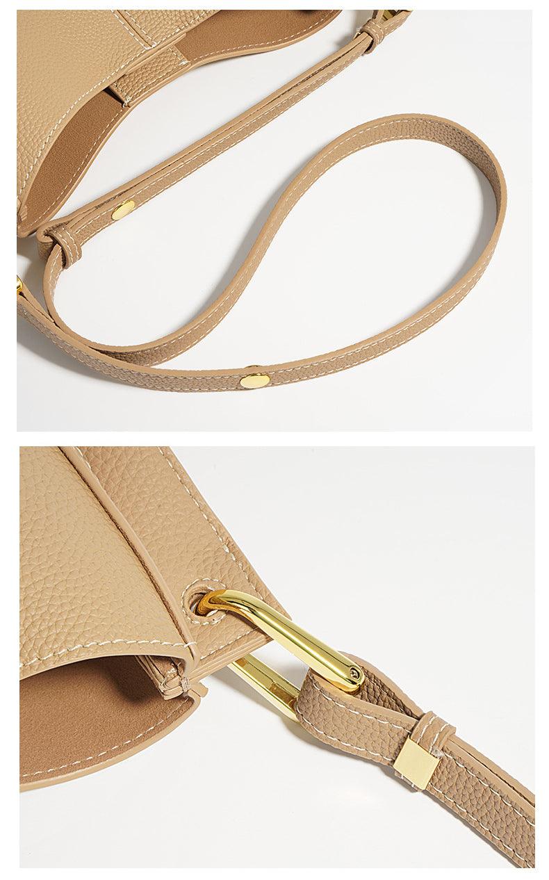 Smooth beige calfskin leather saddle bag with gold hardware and adjustable strap details