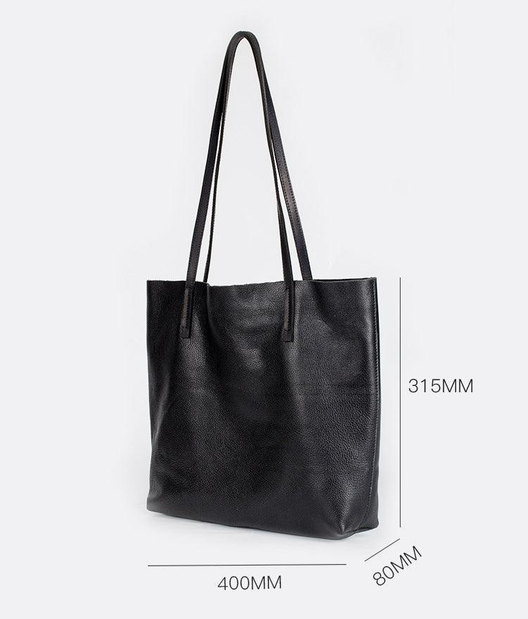 Black full-grain leather tote bag with long handles, simple design, size dimensions shown