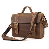 Handcrafted vintage style brown leather shoulder bag with buckled flap and adjustable strap