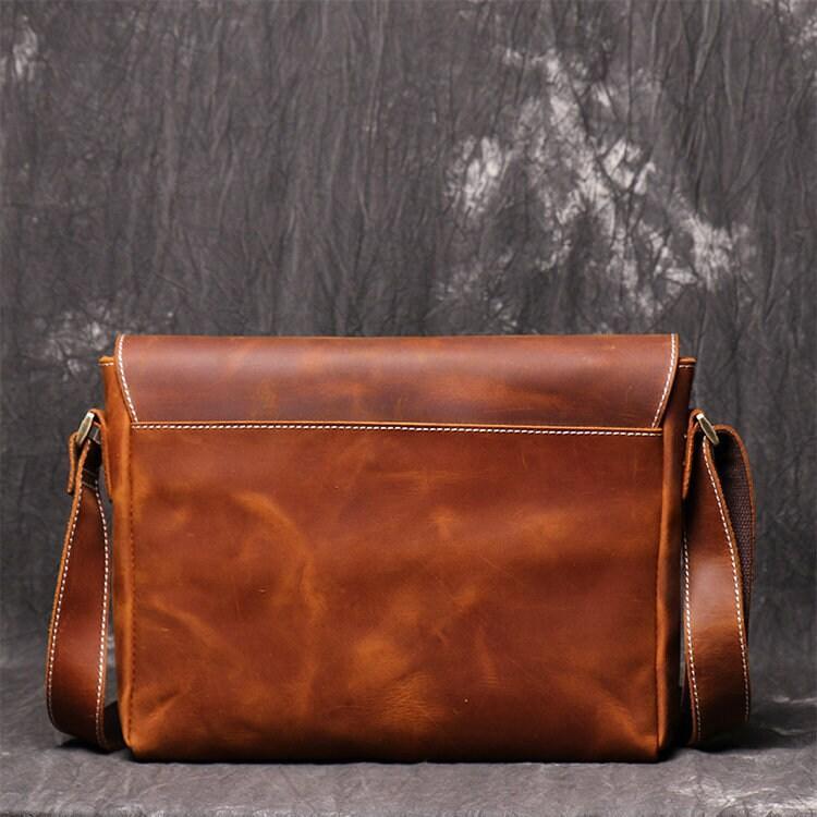 Handmade retro cowhide leather shoulder bag with flap closure and adjustable strap