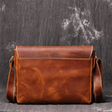 Handmade retro cowhide leather shoulder bag with flap closure and adjustable strap