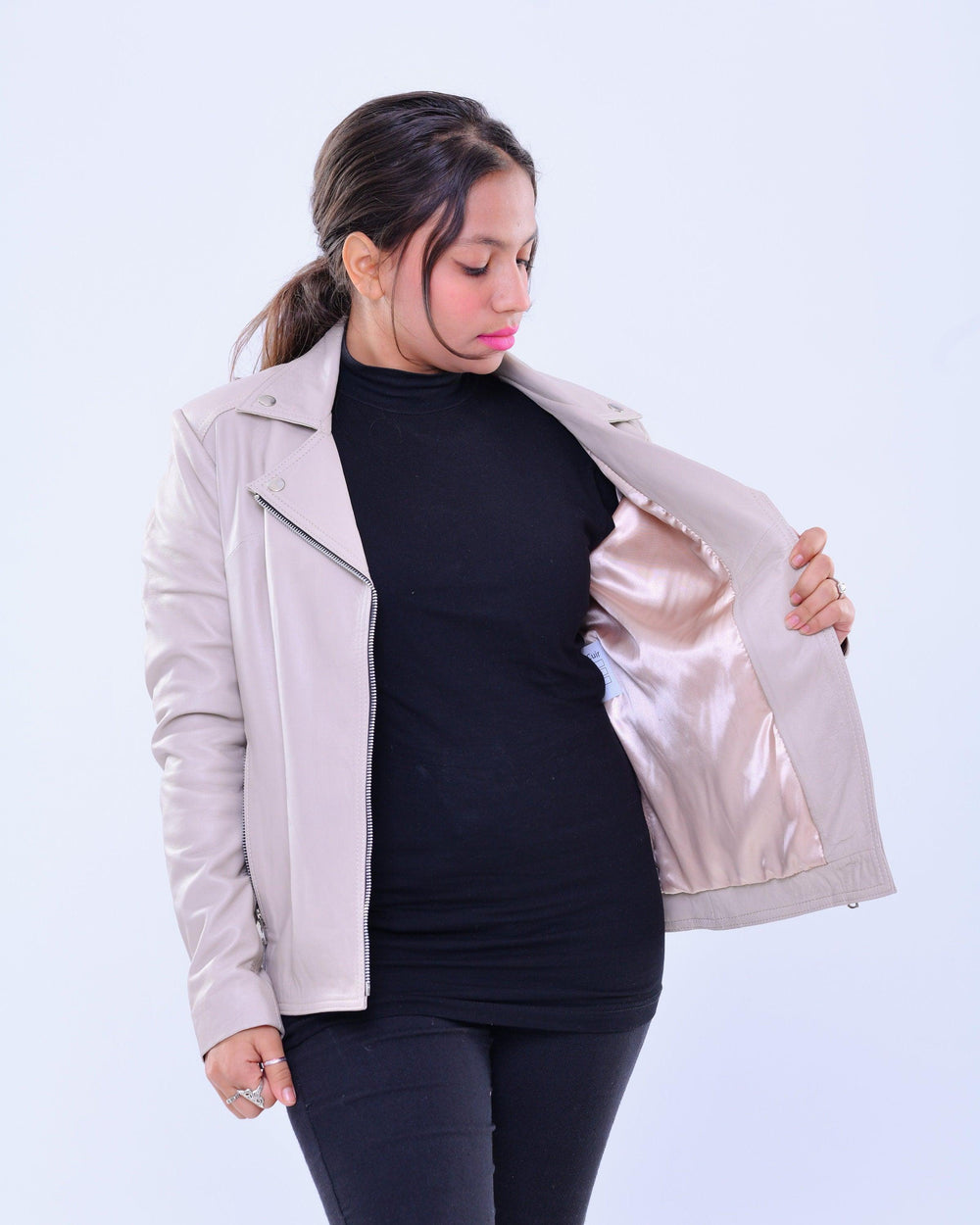 Woman modeling slim fit grey genuine leather biker jacket with satin lining