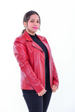 Woman wearing slim fit red genuine leather biker jacket against white background