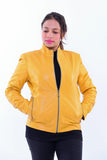 Woman wearing a slim fit yellow genuine leather biker jacket with zipper pockets
