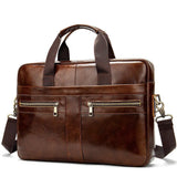 Brown leather shoulder laptop bag with front zip pockets and detachable strap
