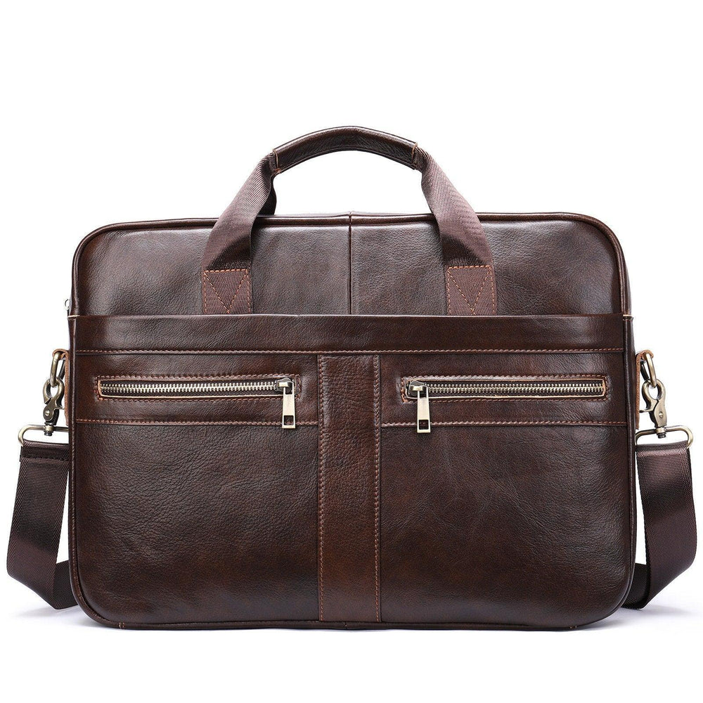 Brown leather shoulder laptop bag with dual top handles, front zip pockets, and adjustable strap