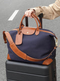 Handmade recycled nylon cowhide tote bag with cowhide leather handles and adjustable crossbody strap